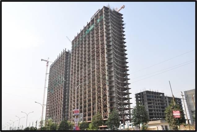 Construction update photos of Bhutani Alphathum's Tower B and C on March 2018